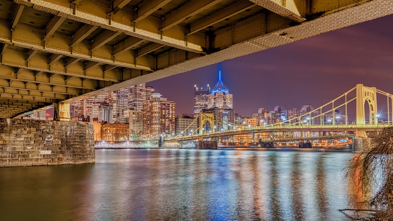 picture of downtown pittsburgh from under a bridge