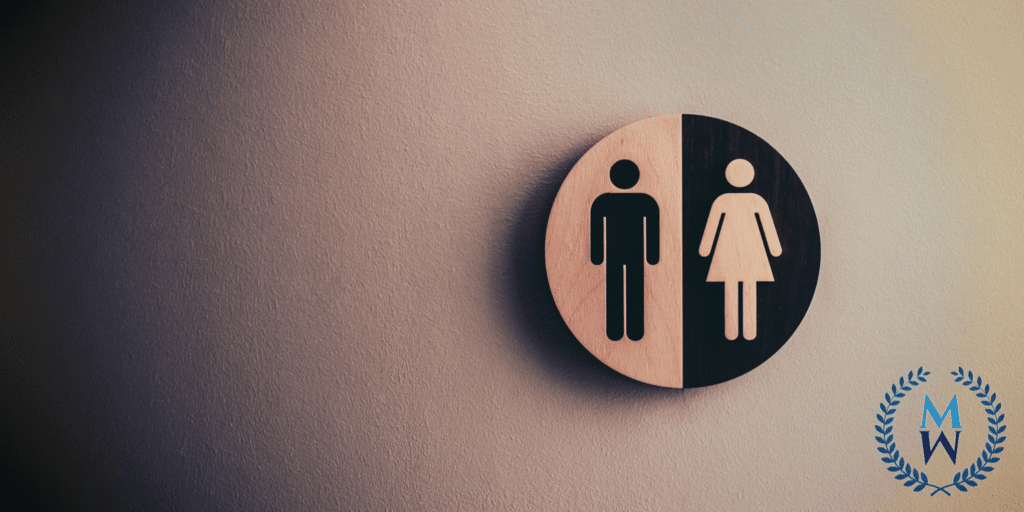 bathroom sign wiht female and male images