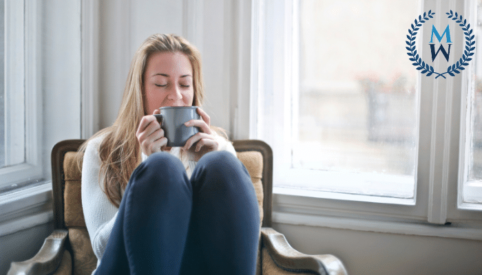 woman relaxing drinking cup of tea