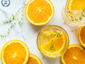Wellness Today Blogs oranges and glasses of infused water ariel view
