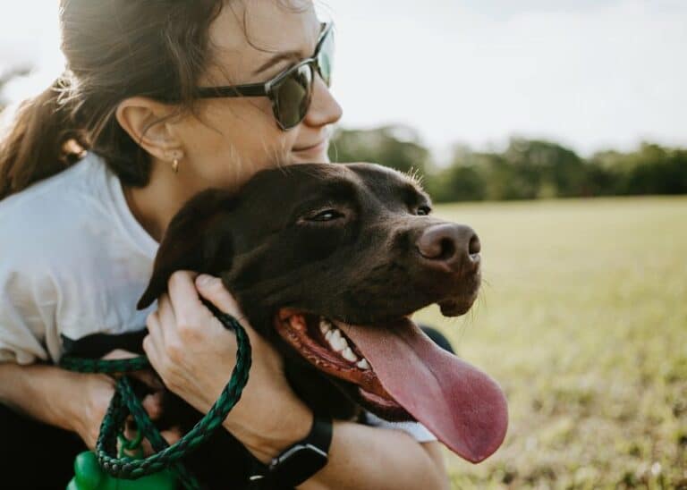 girl holding dog finding comfort | ESA | emotional support animal evaluation online | ESA online | Makin Wellness