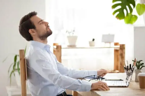 man taking a break to breath