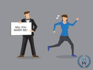 Wellness Articles woman running from marriage proposal