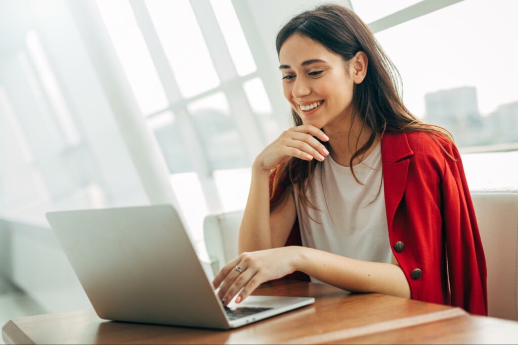 A woman sits at her computer, talking to her online therapist about her struggles with psychopathic behavior.
