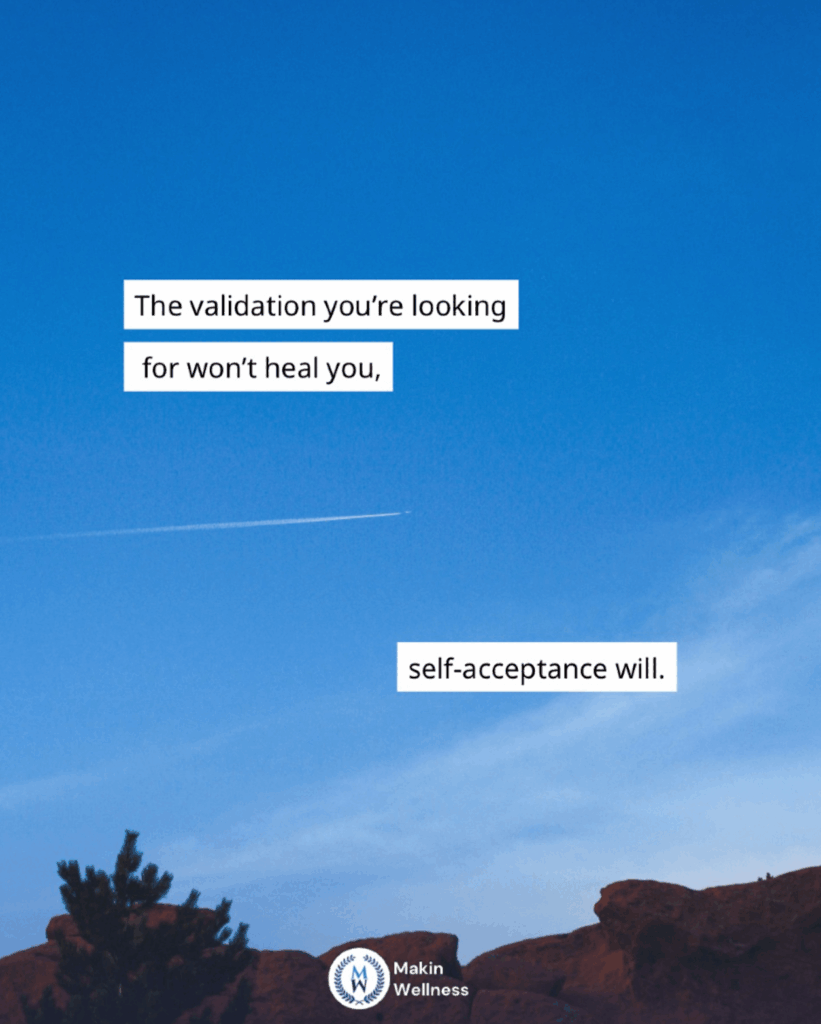 Inspirational quote against a clear blue sky reading, “The validation you’re looking for won’t heal you, self-acceptance will,” with mountains and a tree silhouette below, encouraging a shift away from self deprecating beliefs toward self-worth.