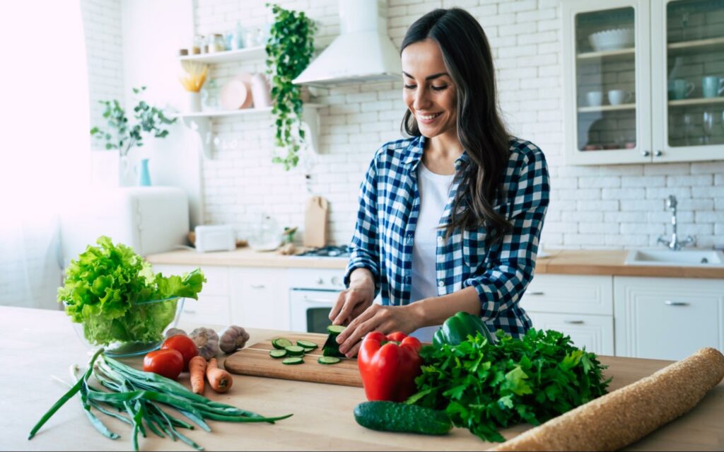 Cooking a healthy dinner for her partner is an act of service.