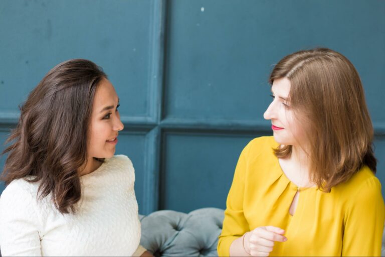 Two women talking about their feelings by using a variety of words to describe their emotions.