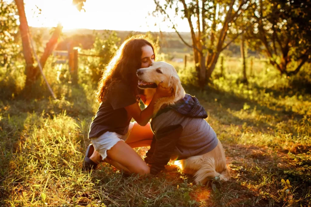 Young woman and dog enjoying a better life thanks to self esteem therapy