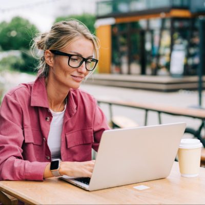A woman researching symptoms of ASD level 1.