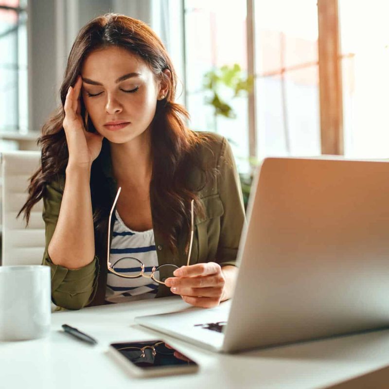 Tired business woman in stress goes through stress management therapy Stress Management Therapy