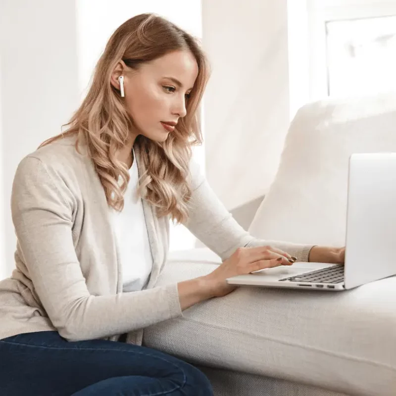 Adult white woman browsing online finding support for Obsessive compulsive disorder therapy