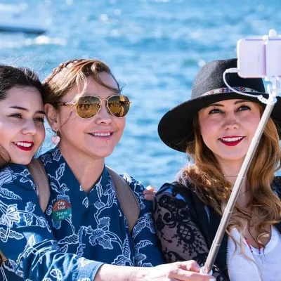 three woman taking a selfie