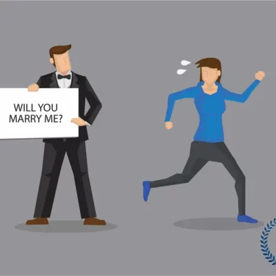 woman running from marriage proposal