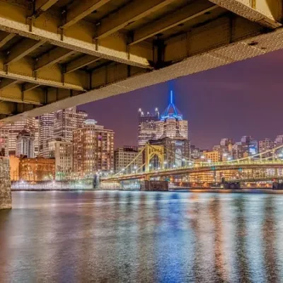picture of downtown pittsburgh from under a bridge