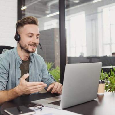 Man using a laptop for online ADHD treatment