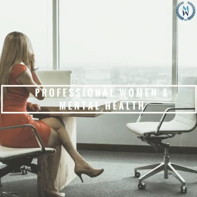 businesswoman at desk banner for professional woman and mental health