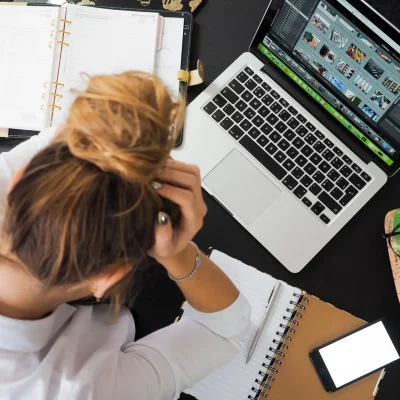 ariel view of overwhelmed woman working