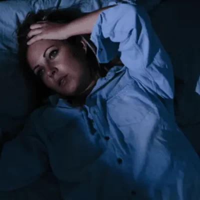 woman with insomnia in bed